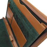 Tan leather writing case interior close up of pocket