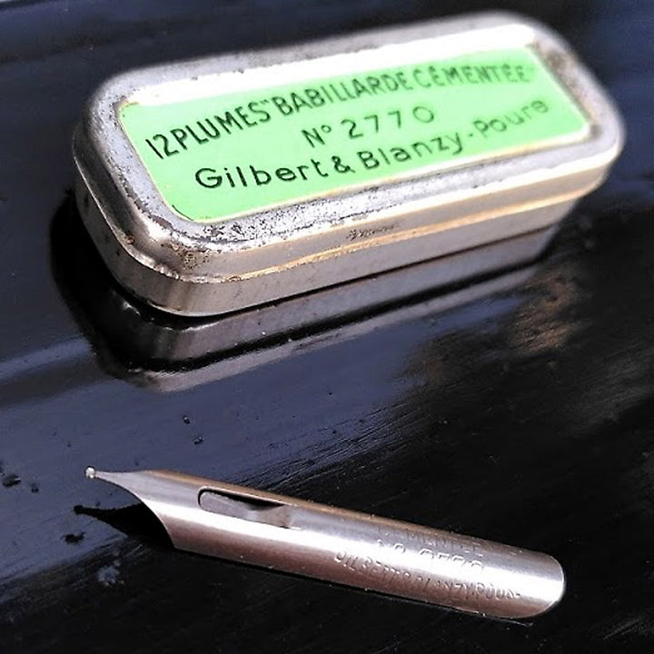 Vintage tin of 12 nibs